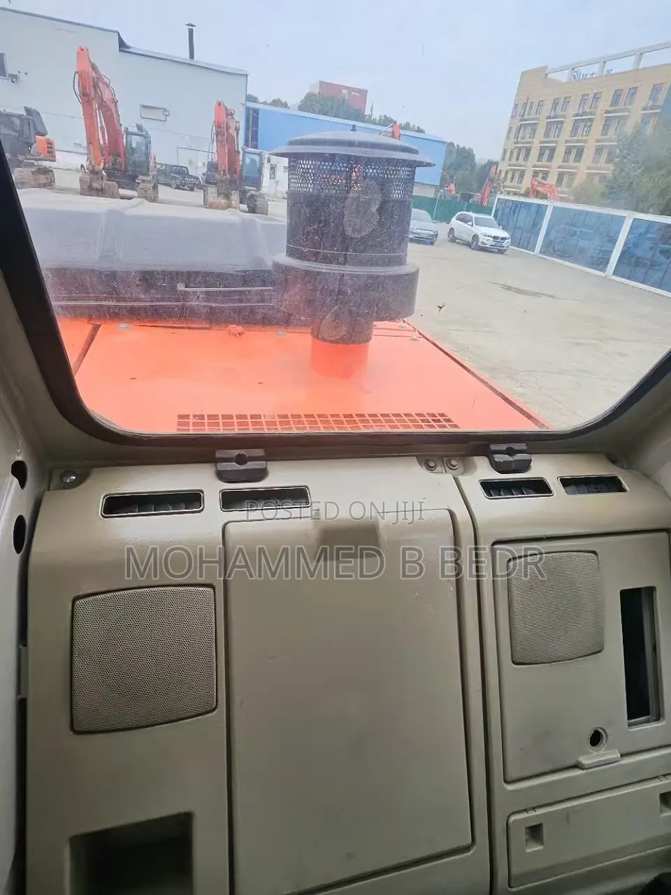 Excavator ታየር ኤክስካቫተር