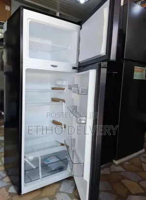 Midea Refrigerator. This Model Is Top-Freezer, Two-Door Refrigerator