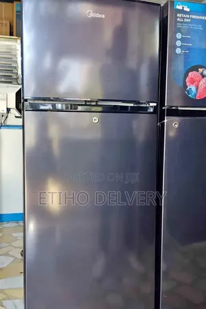 Midea Refrigerator. This Model Is Top-Freezer, Two-Door Refrigerator