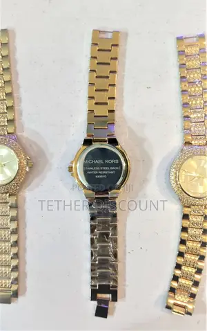 Michael Kors Ladies Gold Watch With Cubic Zirconiasወ ርቃ ማ ሰዓት