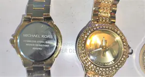 Michael Kors Ladies Gold Watch With Cubic Zirconiasወ ርቃ ማ ሰዓት