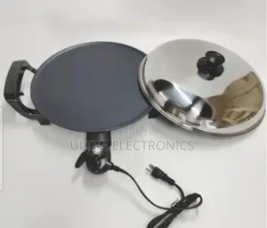 የእጀራ ምጣድ Injera Mitad, Which Is an Electric Griddle Designed For