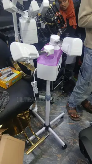 Professional Standing Facial Steamer, Typically in Salons or Spas