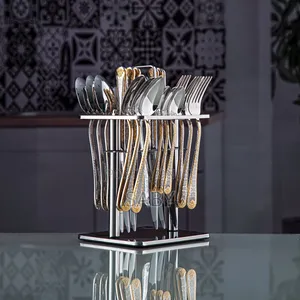 Stainless Steel 24-Piece Cutlery Set With a Gold-Accented Stand.