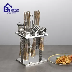 Stainless Steel 24-Piece Cutlery Set With a Gold-Accented Stand.