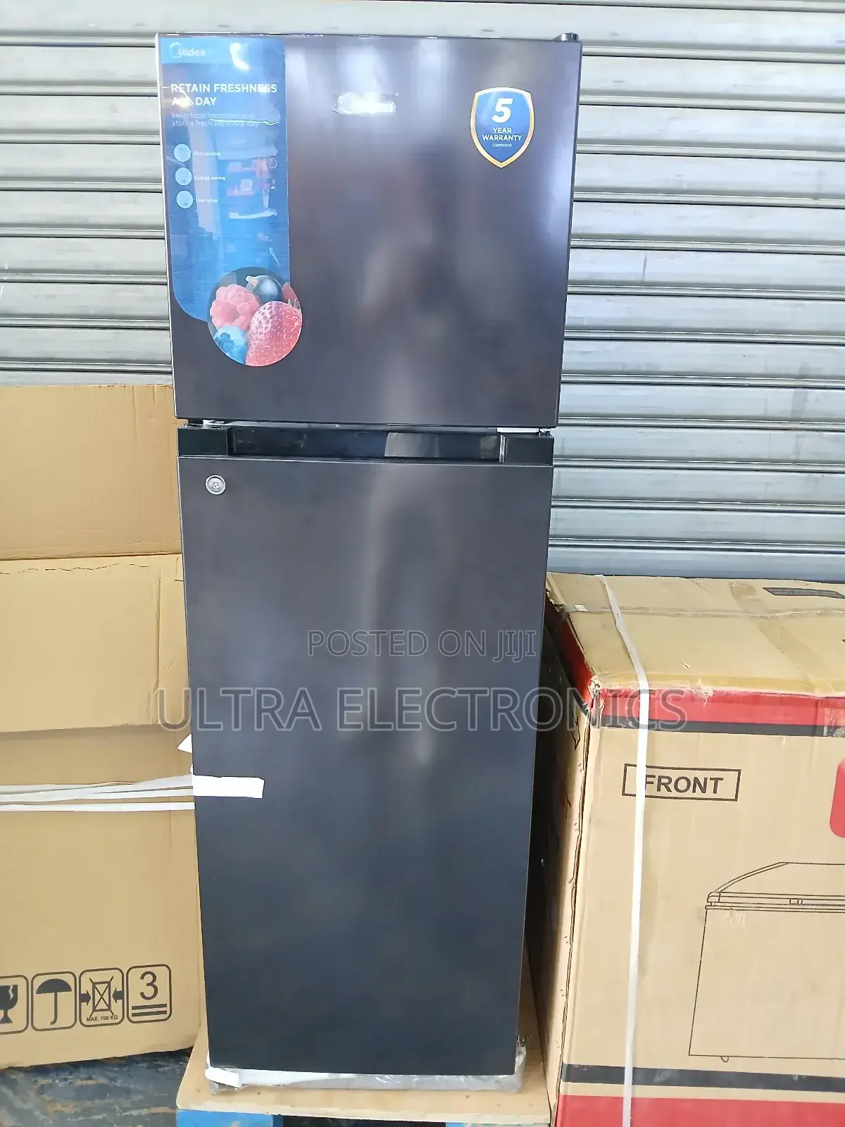 Midea Black Top-Freezer Refrigerator, Likely or Similar, Based on Its