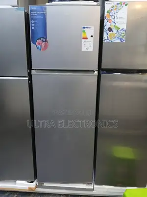 Midea Top-Freezer Refrigerator in a Silver Finish. The Unit Features