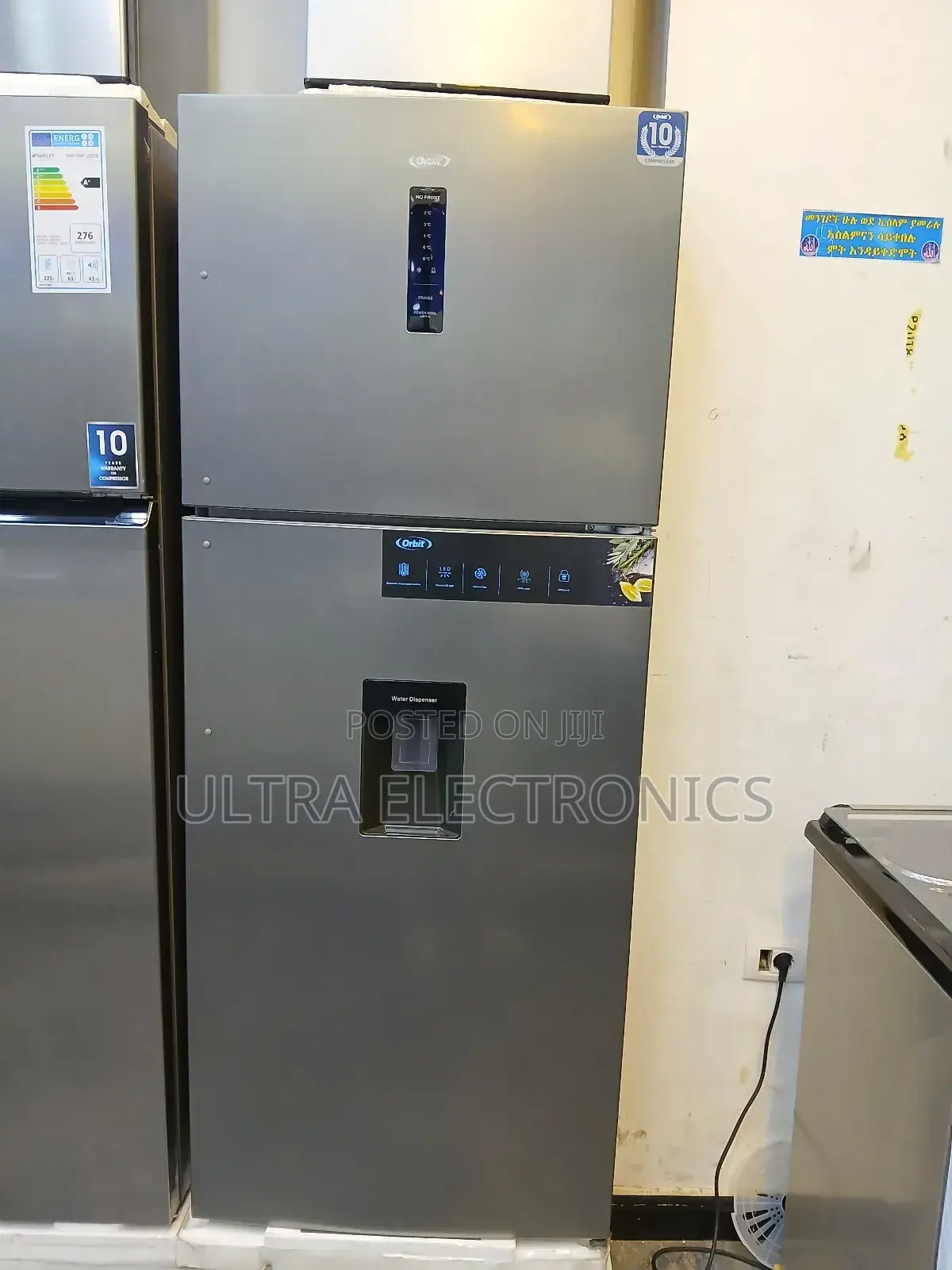 Orbit Freezer Refrigerator Featuring a Built-in Water Dispenser 615 L