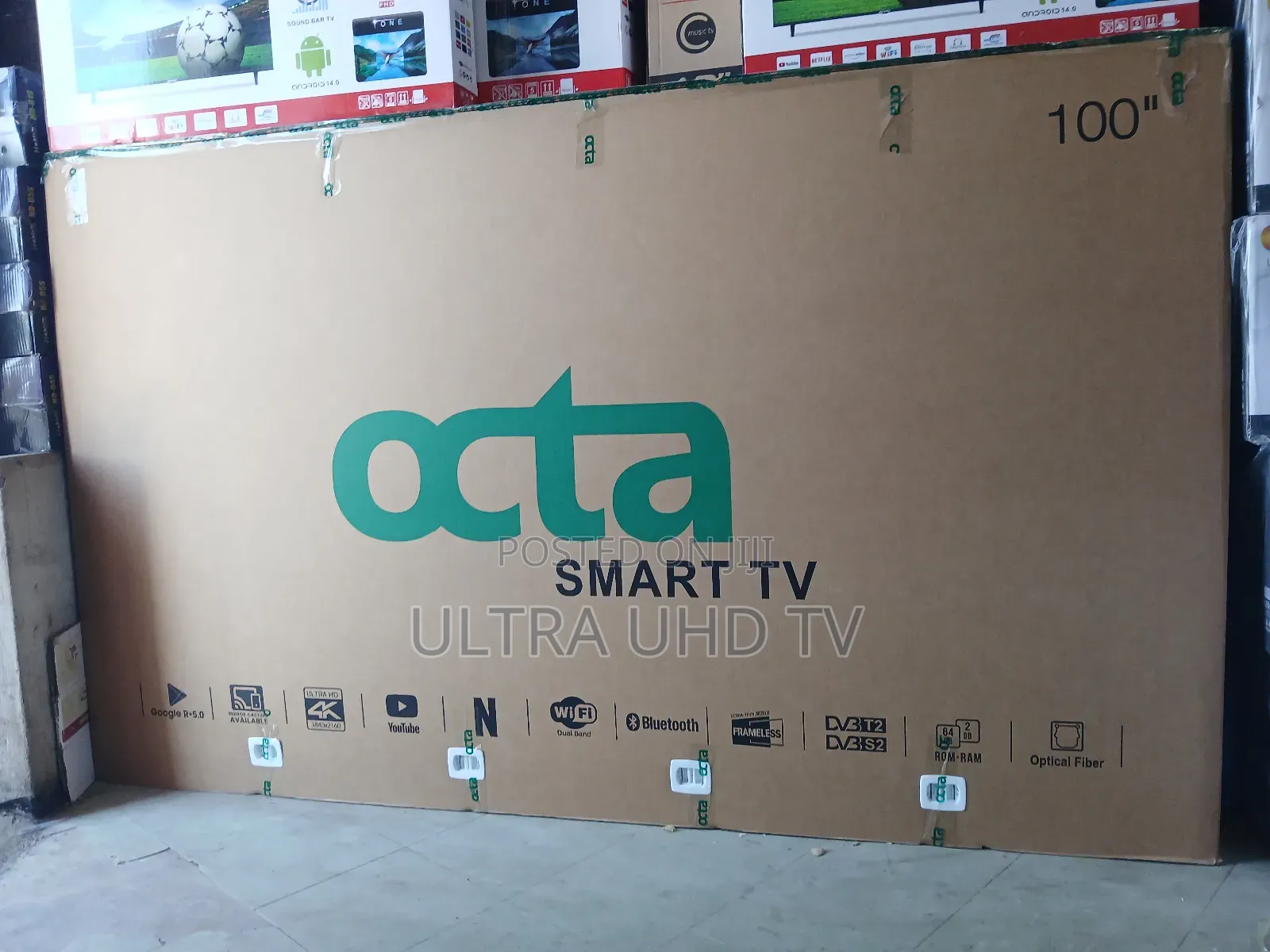 Octa 100-Inch Smart Uhd Tv in Its Original Shipping Box.