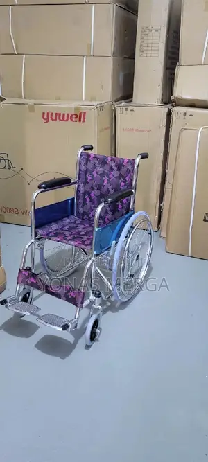 Baby/Children Wheelchair駄脅featuring a Chrome Frame Purple Patterned