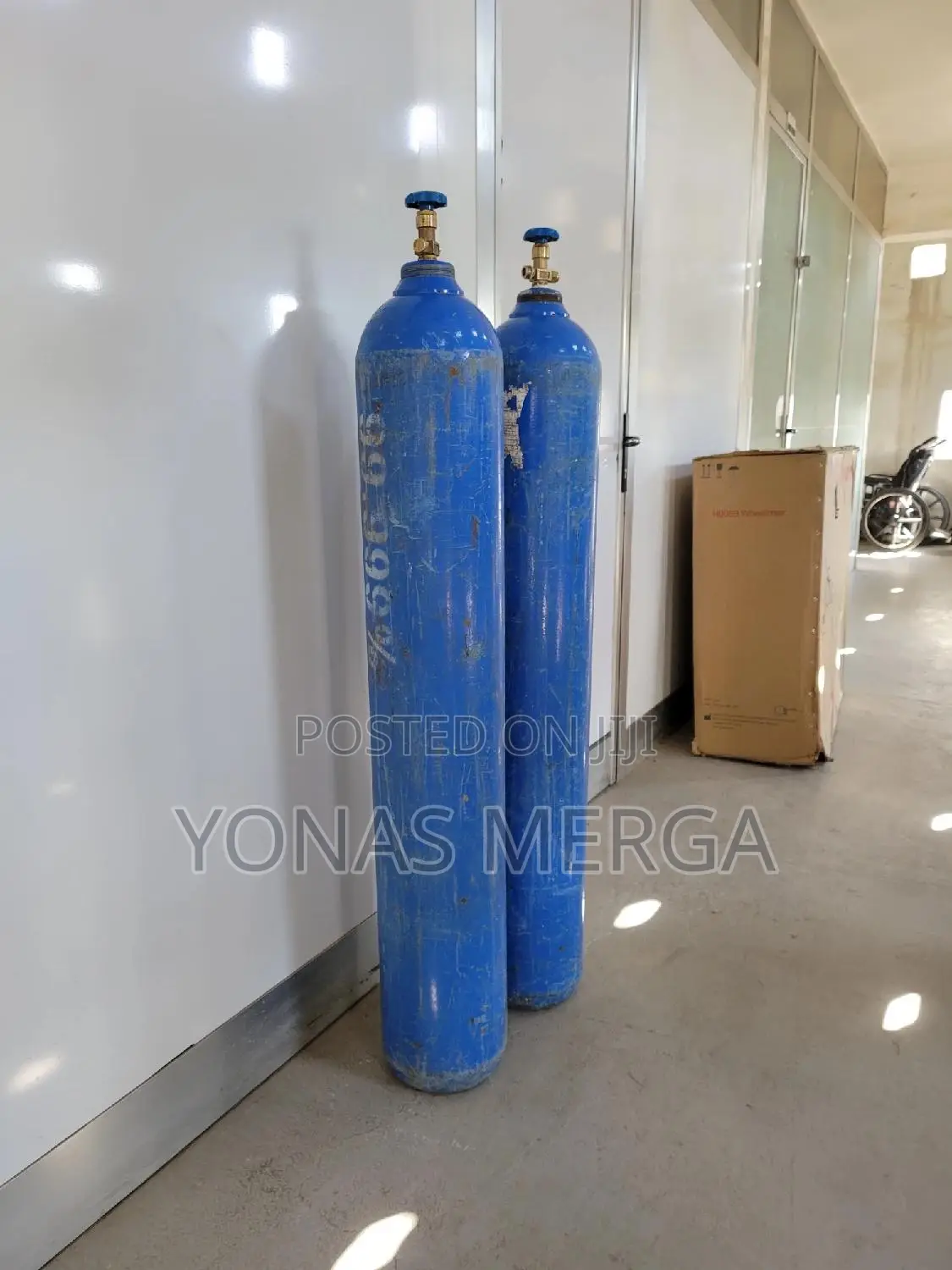 Oxygen Cylinder on the Right Includes a Regulator Flowmeter