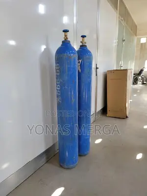 Oxygen Cylinder on the Right Includes a Regulator Flowmeter