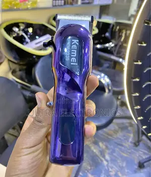 Hair Clipper Kemei Km-2335 Cordless Professional Featuring a Purple