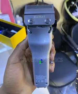 Hair Clipper Kemei Km-2335 Cordless Professional Featuring a Purple