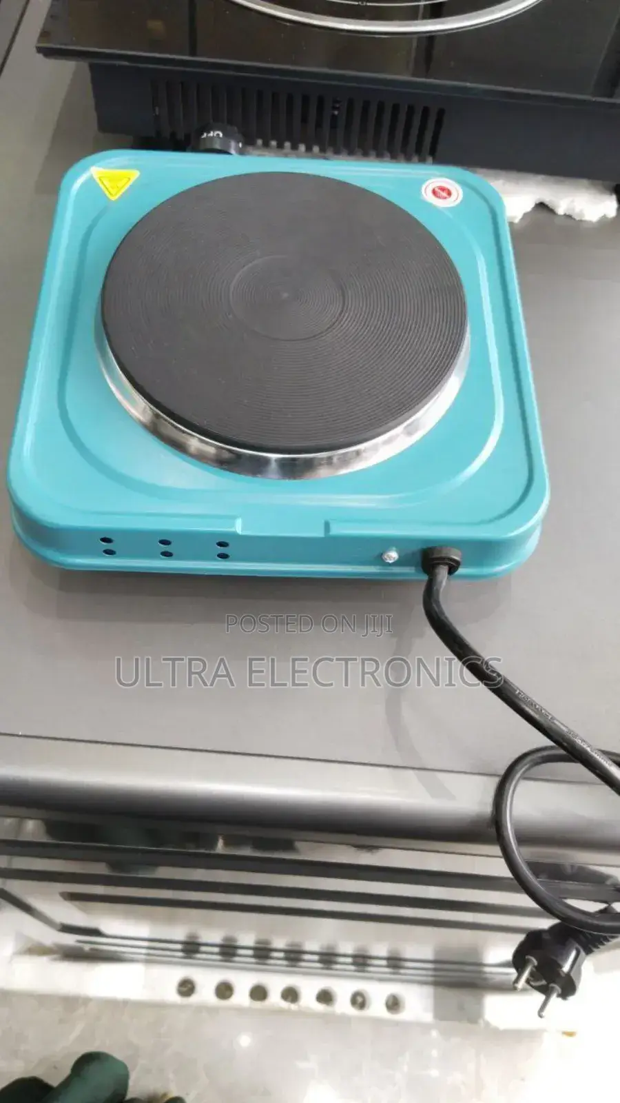 Electric Hot Plate Featuring a Vibrant Blue Carbon Steel Body a 1000w