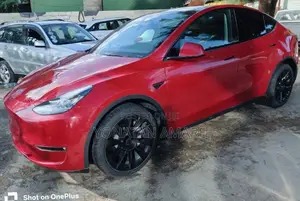 Tesla Model Y 2023 Burgundy