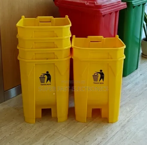 Stacked Yellow Trash Bins and Recycling Station