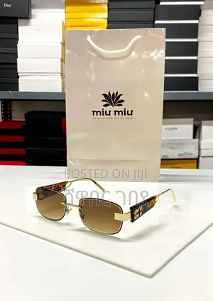 Ultra-Modern Miu Miu Rimless Rectangular Sunglasses