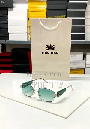 Ultra-Modern Miu Miu Rimless Rectangular Sunglasses