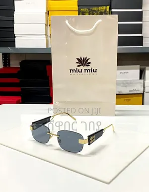Miu Miu Rimless Sunglasses