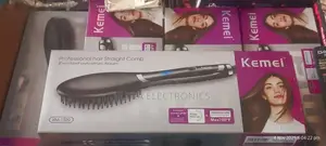 Kemei Hair Straightener Brush Km-1320 for Styling Hair.