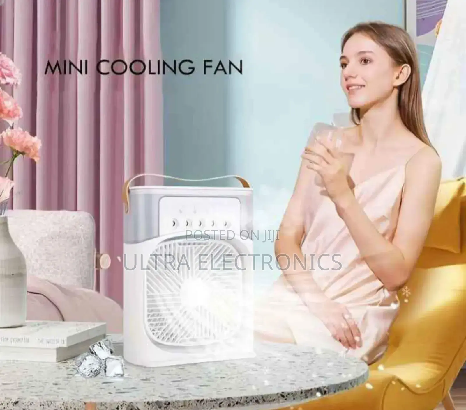 Portable Air Cooler Fan With Water Misting Capabilities.