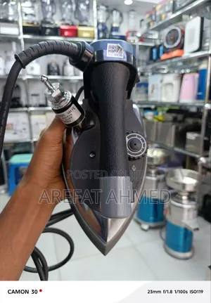 Silver Star Gravity Feed Steam Iron, a Heavy-Duty Industrial Iron
