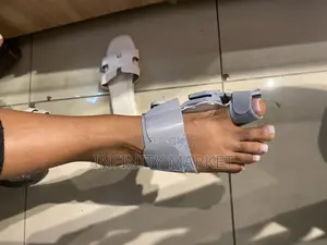 አዉራጣት ማስተካከያ