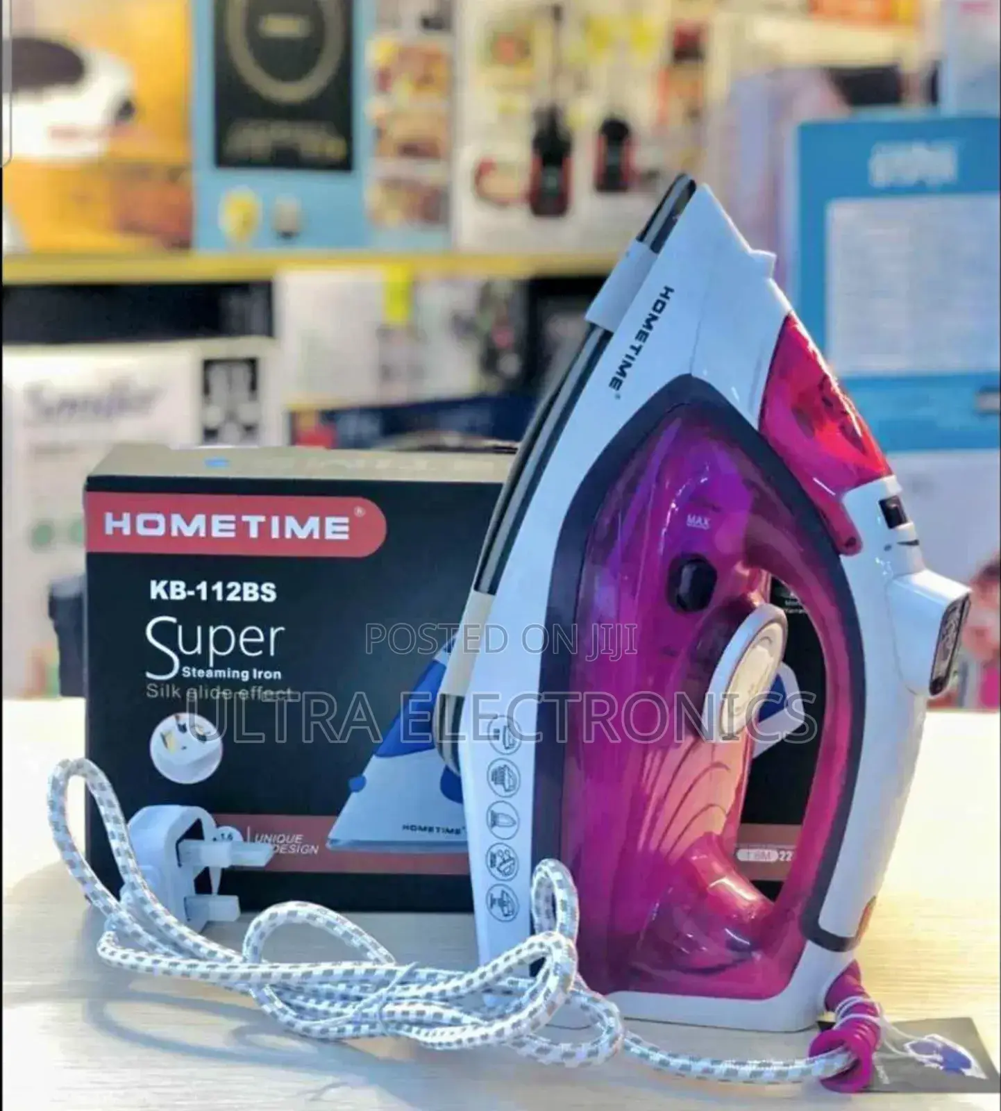 Steam Iron Hometime Model Kb-112bs in White and Magenta.