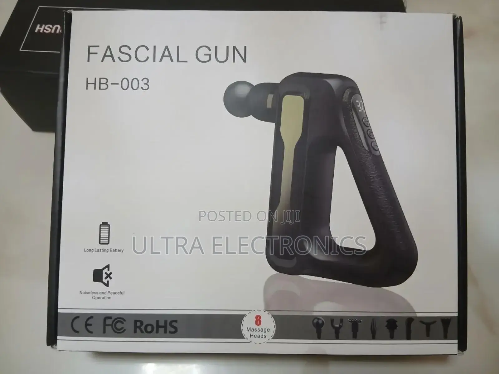 Fascial Gun Hb-003 Muscle Massage Device Shown in Its Packaging.