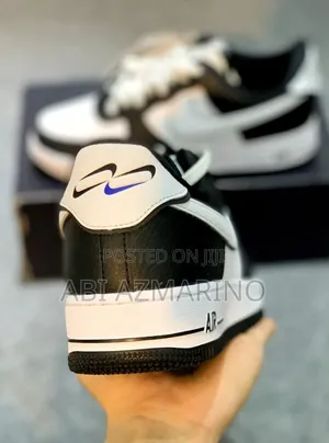 Nike Air Force 1 Low '07 Lv8 Sneakers in a Black and White "Panda"