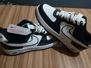 Nike Air Force 1 Low '07 Lv8 Sneakers in a Black and White "Panda"