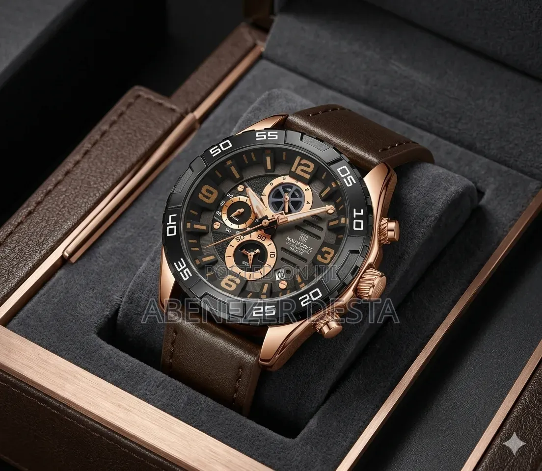 A Naviforce Quartz Watch a Rose Gold Case and Brown Leather Strap
