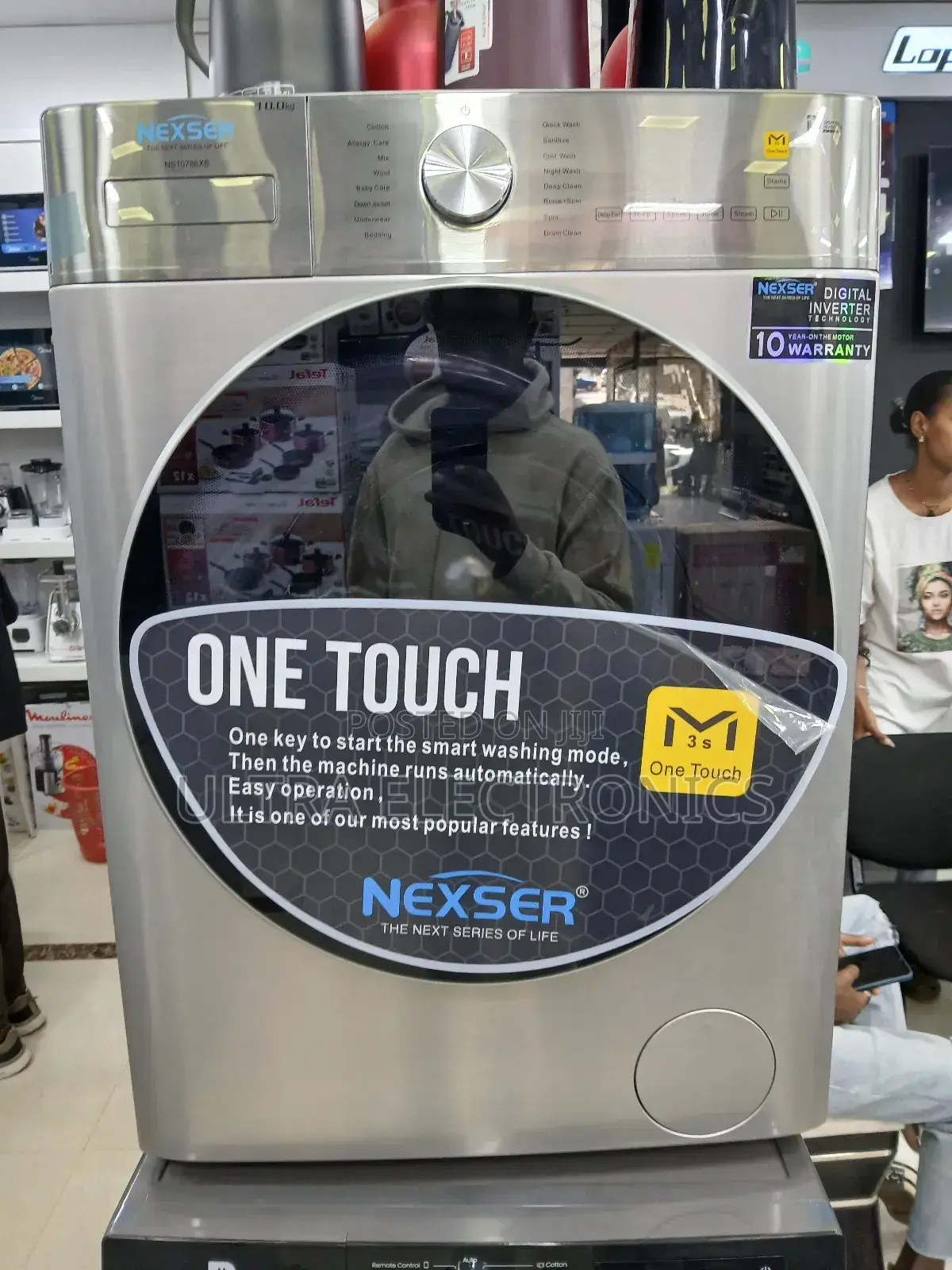 Nexser Model Ns10786xs Front-Load Washing Machine in Silver.