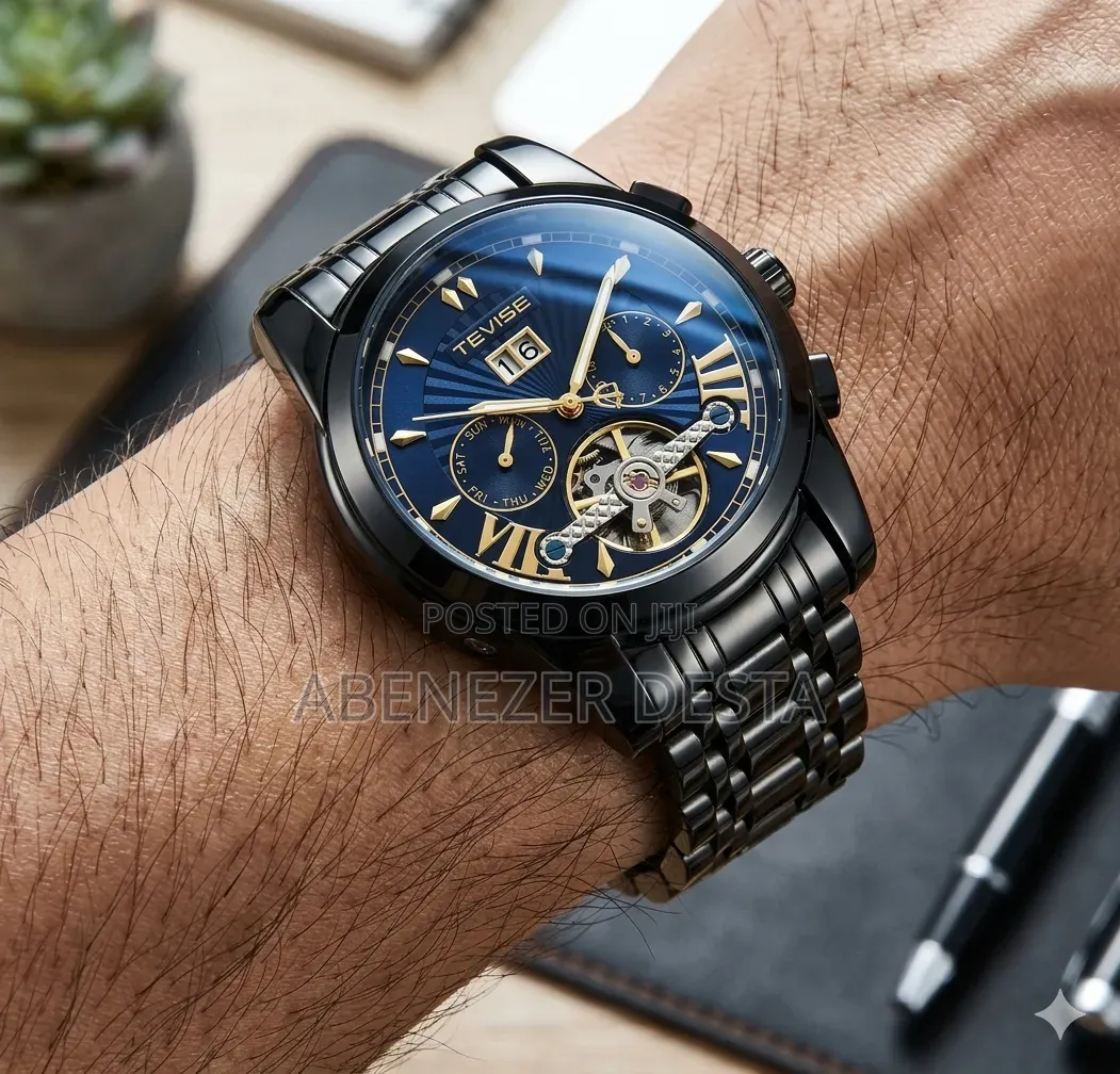 Tevise All-Black Automatic Watch With a Blue Skeleton Dial.