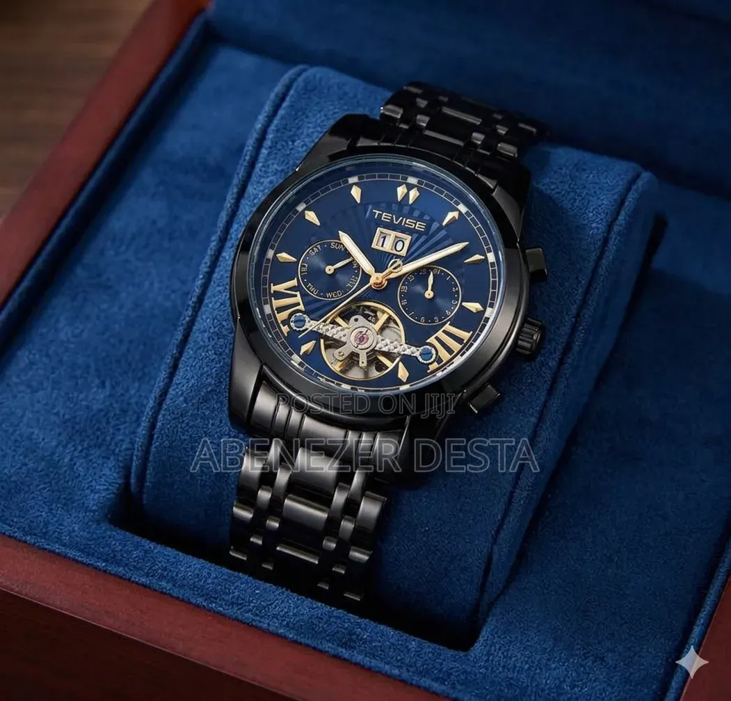 Tevise All-Black Automatic Watch With a Blue Skeleton Dial.