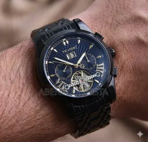 Tevise All-Black Automatic Watch With a Blue Skeleton Dial.
