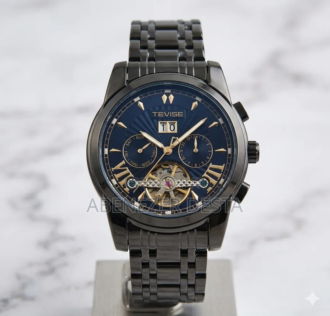 Tevise All-Black Automatic Watch With a Blue Skeleton Dial.