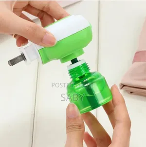 Electronic Mosquito Repellent Liquid Heater Set.