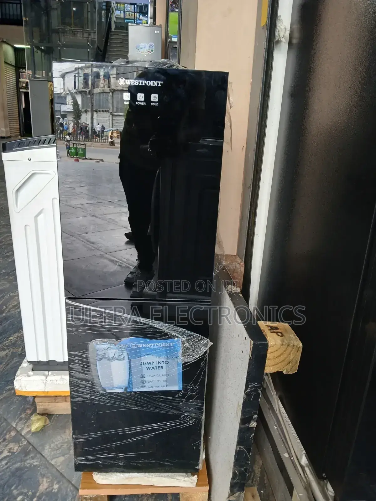 Westpoint Water Dispenser Featuring a Black Glass Front Panel With Hot