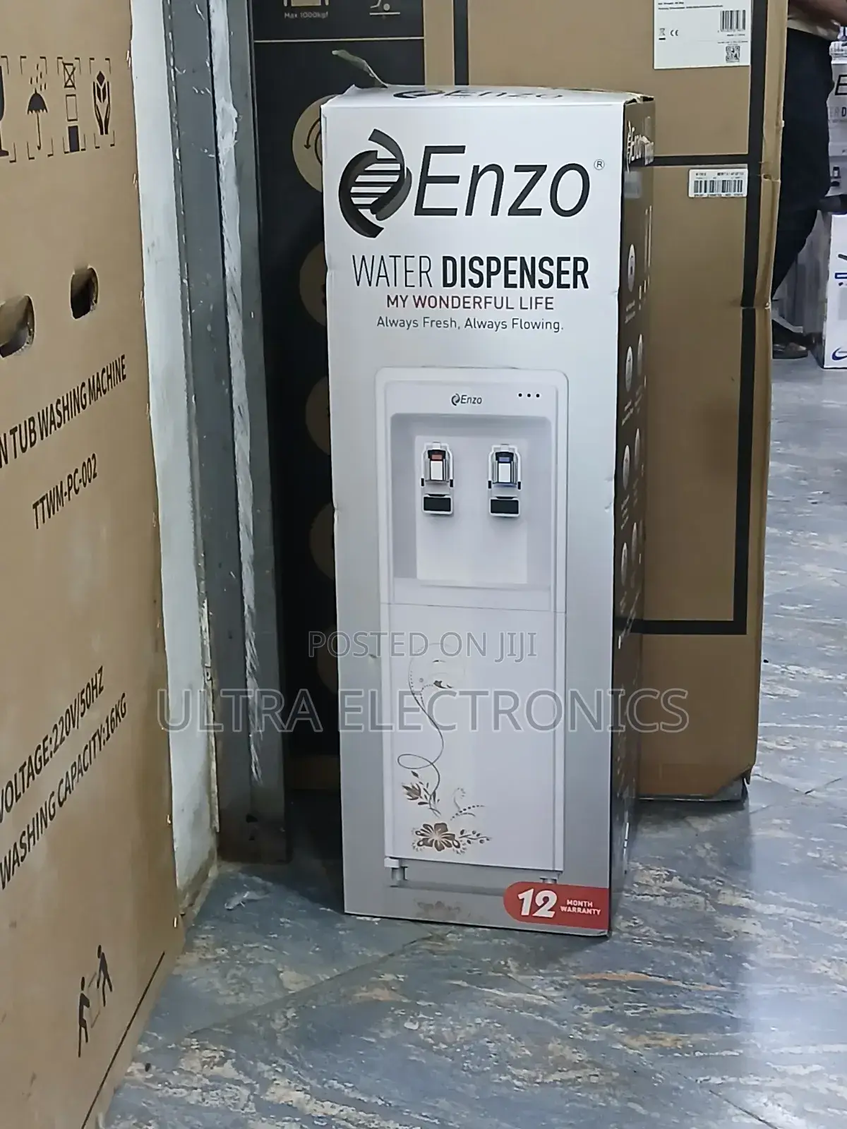 Enzo Water Dispenser Freestanding With a Top-Loading Design.