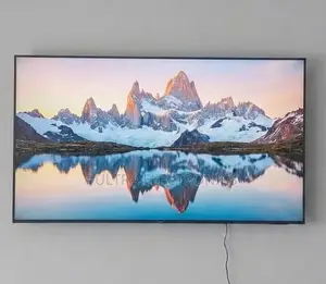 Samsung Qled 65 Inch Tv Displaying a Vibrant Scene of Bioluminescent