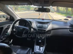 Hyundai Avante 2013 Brown