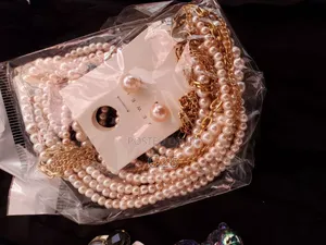 Set of Pink, Multi-Strand Pearl Necklaces and Matching Stud Earrings