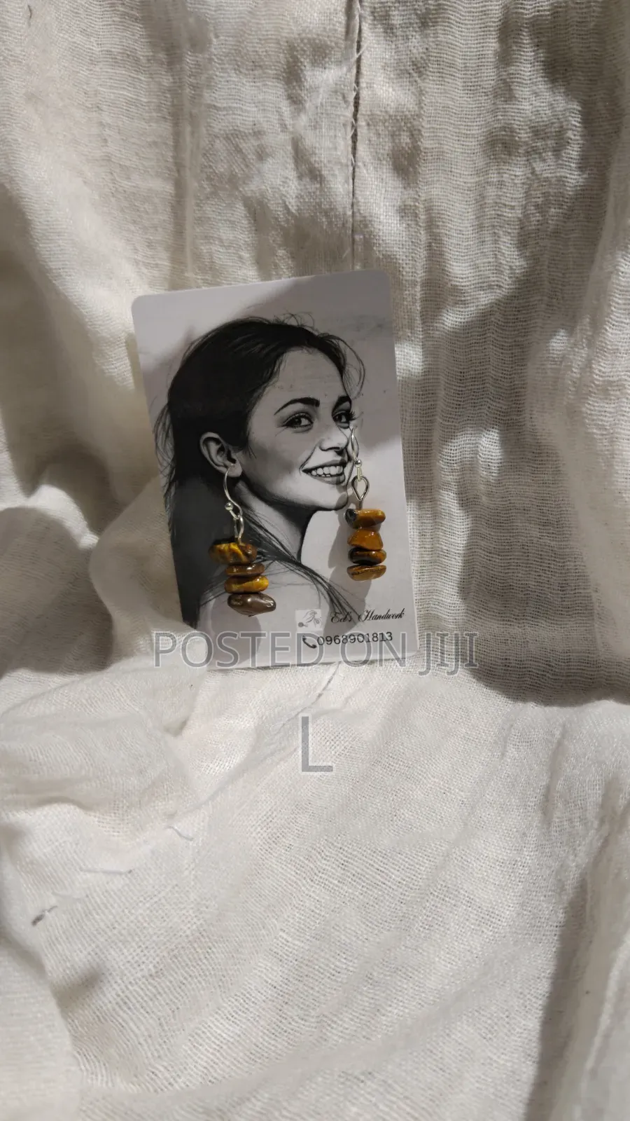 Earing by Eel's Handwork