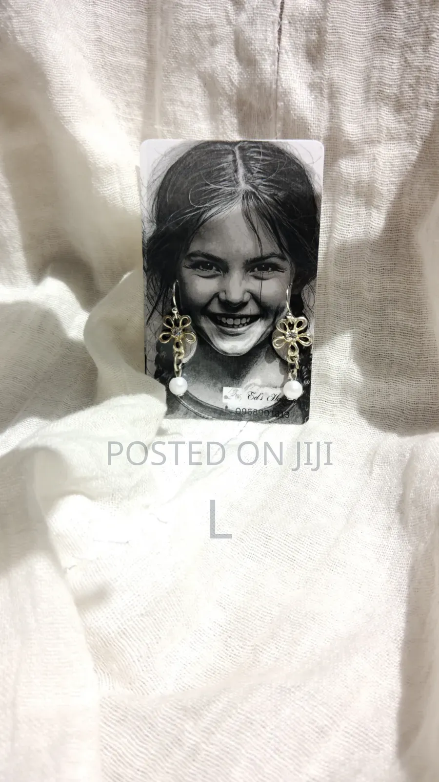 Earing by Eel's Handwork