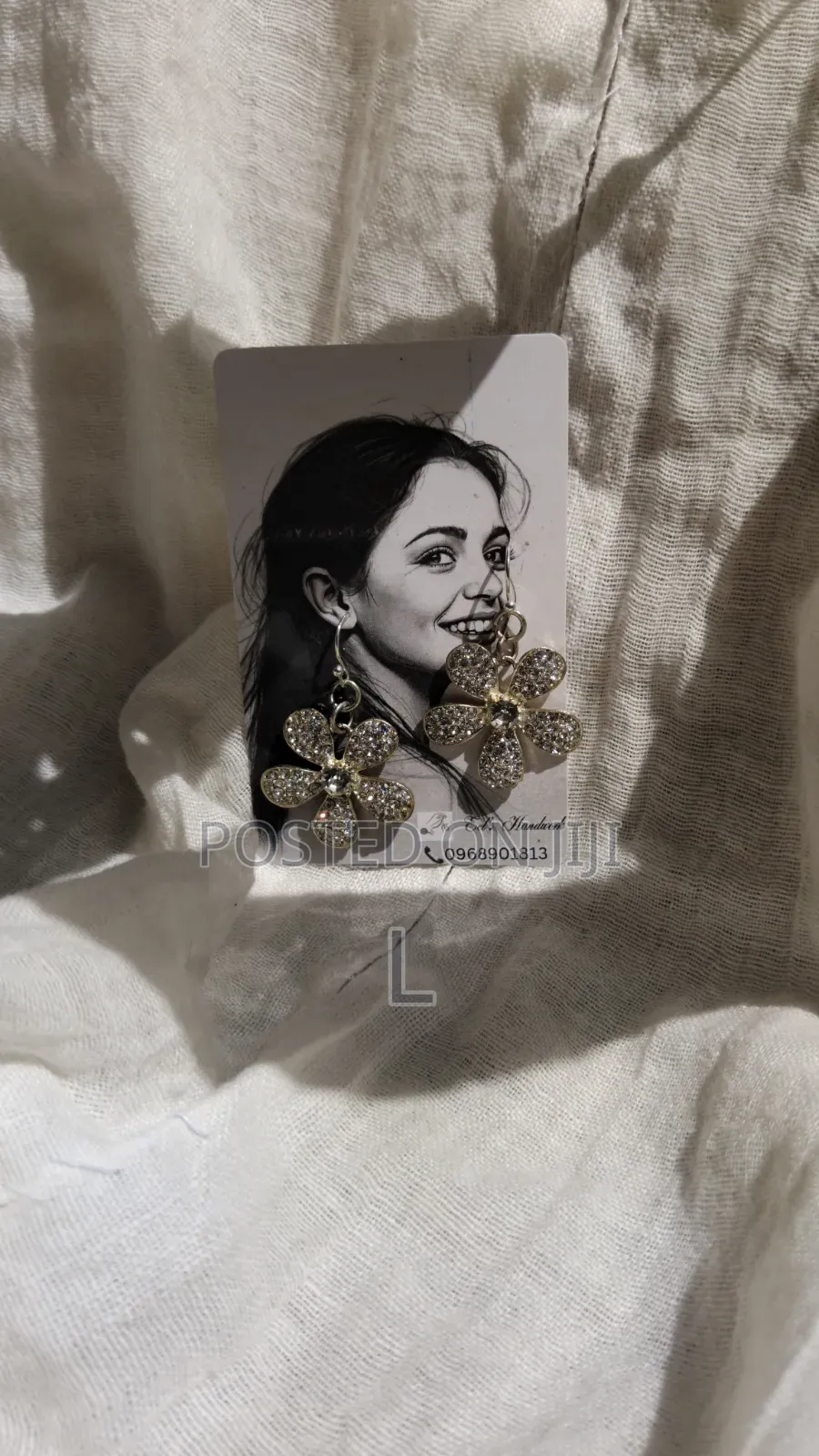 Earing by Eel's Handwork