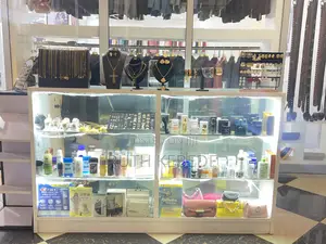 Cosmetics Display With Cosmetics And Jewelry Accessories