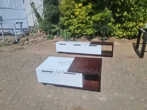 White and Brown Tv Stand With Center Table