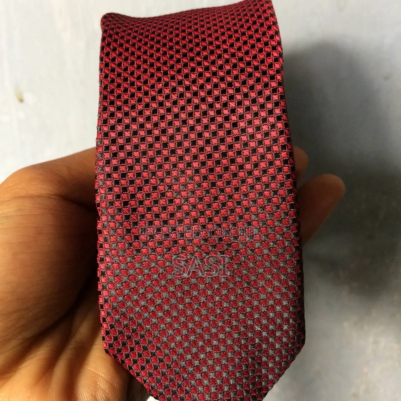Perfect Gift Idea: A Timeless Red Tie That Matches Suit and Occasion.